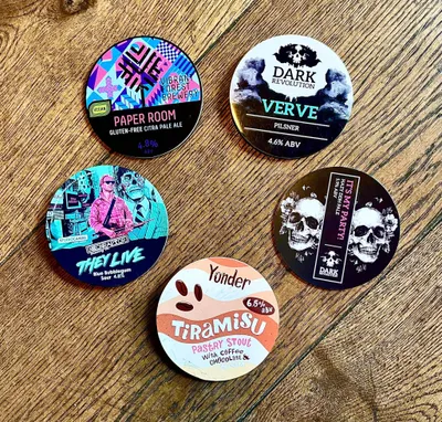 Beer badges on table