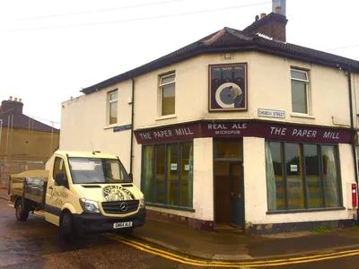 A truck delivering beer to a micro pub